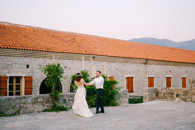 People in front of building