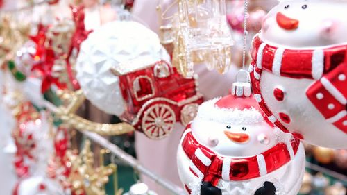 Close-up of christmas decoration hanging at market stall