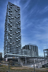 Low angle view of modern building against sky