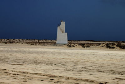 Scenic view of desert against clear sky