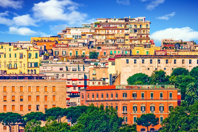 High angle view of residential buildings against sky