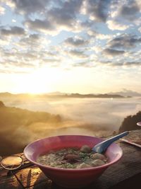 Panoramic shot of food on table against sky during sunset