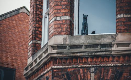 Low angle view of historic building against sky