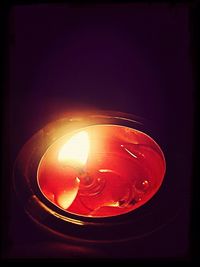 Close-up of lit candle