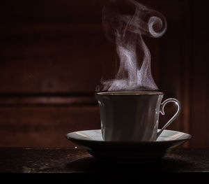 Close-up of coffee cup on table