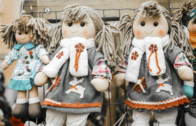 Close-up of dolls for sale