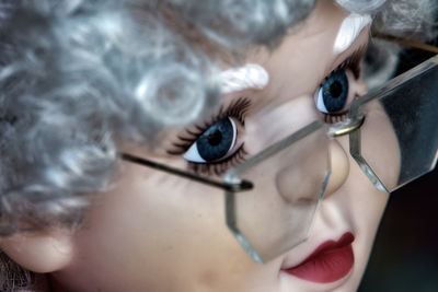 Extreme close up of a mannequin in a shop window display