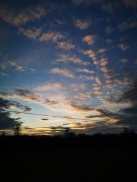 Scenic view of silhouette landscape against sky during sunset