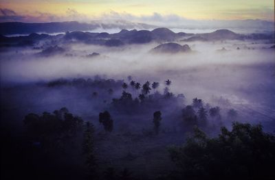 Scenic view of mountains against sky during sunset