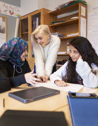 Teacher and students in classroom