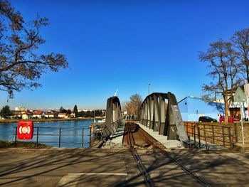 Scenic view of building against clear blue sky