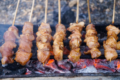 Close-up of meat on barbecue grill