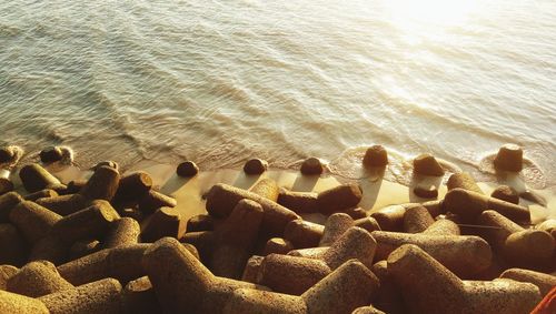 High angle view of pebbles on beach