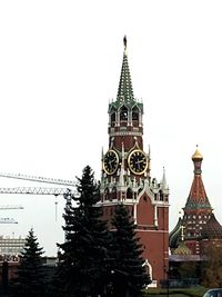 Low angle view of illuminated building against clear sky