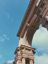 Low angle view of building against blue sky