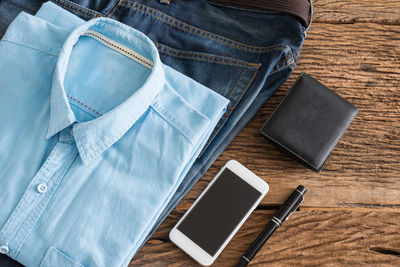 High angle view of mobile phone on table