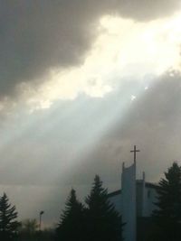 Built structure against cloudy sky