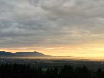 Scenic view of landscape against sky during sunset