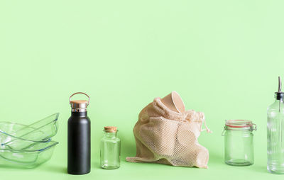 Close-up of glass bottles on table