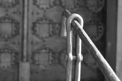 Close-up of padlock on metal gate