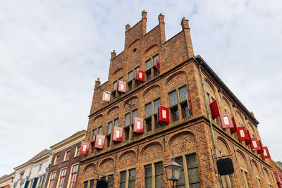 Low angle view of old building against sky