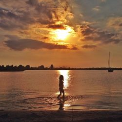 Scenic view of sea at sunset