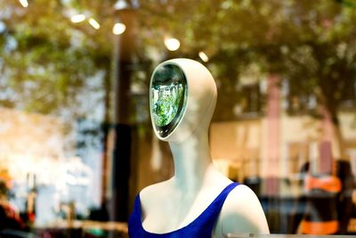 Close-up of reflection on tree trunk