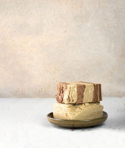 Minimalistic. tasty eastern sweet dessert halva from sunflower seeds, cocoa and tahini 