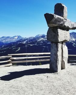 Scenic view of mountains against clear blue sky
