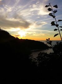 Scenic view of silhouette landscape against sky during sunset