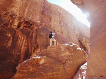 Man standing on rock formation