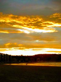 Scenic view of dramatic sky during sunset