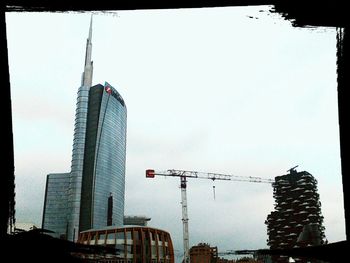 Low angle view of skyscrapers against clear sky