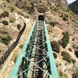 High angle view of steps by bridge