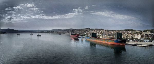 Scenic view of bay against sky