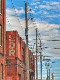 Low angle view of red building against sky