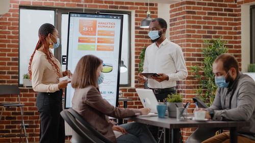 Business colleagues working in office