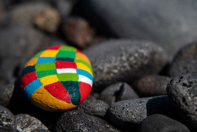 Close-up of multi colored stones on rocks