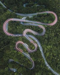 High angle view of winding road on landscape