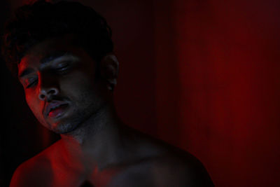 Portrait of young man looking away