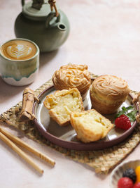 Vanilla soes cakes or soes vla  served in plate. selective focus