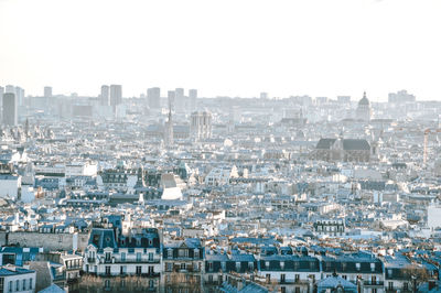 Cityscape against clear sky
