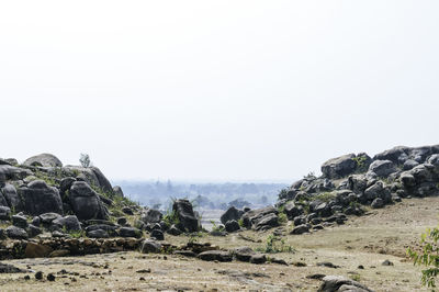 Scenic view of rocky landscape against clear sky
