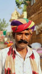 Portrait of traditional man wearing hat