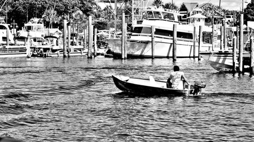 Boats sailing in river