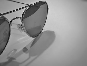 Close-up of sunglasses on white background