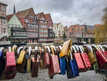 Row of buildings against sky in city