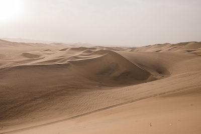 Scenic view of desert against sky in peru