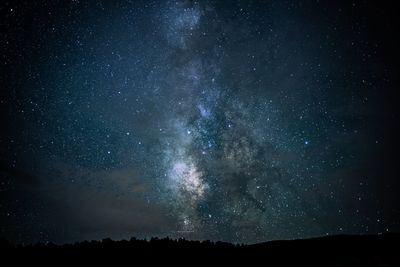 Low angle view of stars in sky at night