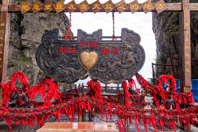 Statue against temple building